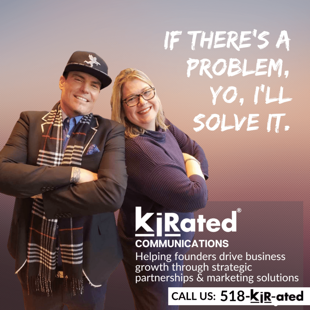 Two professionals smiling and posing together, featuring the text 'IF THERE'S A PROBLEM, YO, I'LL SOLVE IT.' The background has a gradient color scheme. The KiRated Communications logo and slogan are also visible, promoting their marketing and business solutions.